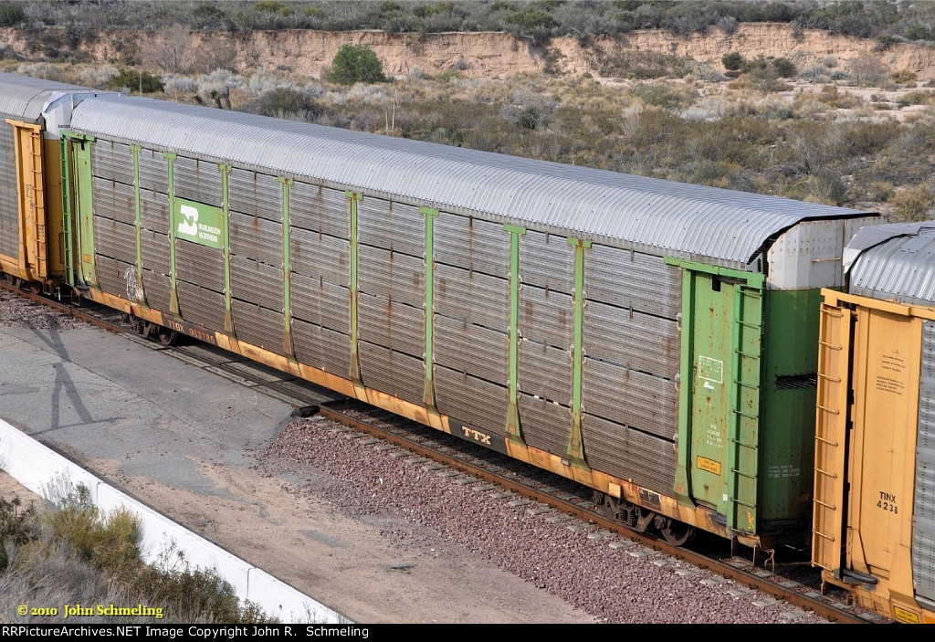 TTGX 963785 with BN auto rack at Alray-Cajon Pass CA. 2/17/2010